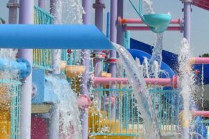 running splash pad with dumpers, waterfalls, and fountains